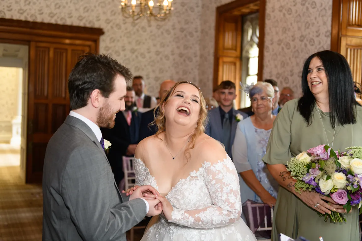 Hensol Castle wedding photographer laughing bride