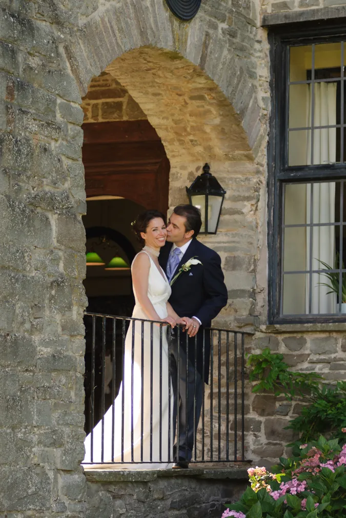 Llangoed hall wedding bride & groom kissing