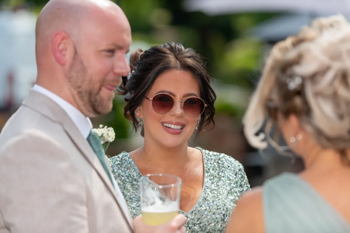 Bridesmaid chatting at Greenmeadow Golf Club, Cwmbran
