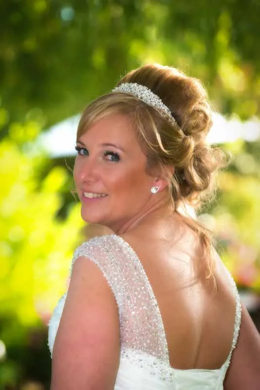 bride in gardens of The Parkway Hotel & Spa by Andrew Hazard Photography