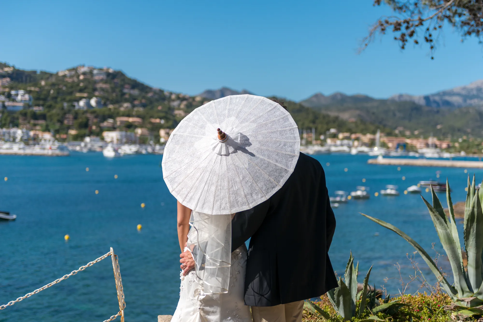 Couple in villa italia overlooking marina