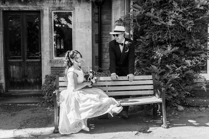 Glen Yr Afon wedding bride & groom kissing in garden