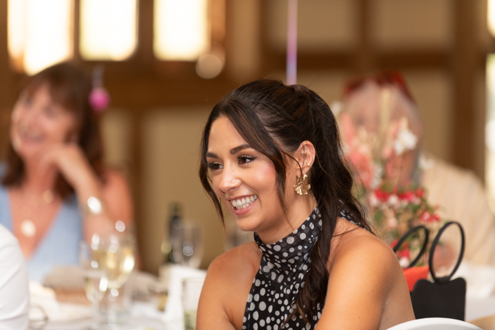 Glen Yr Afon wedding bride looking in mirror in ballroom