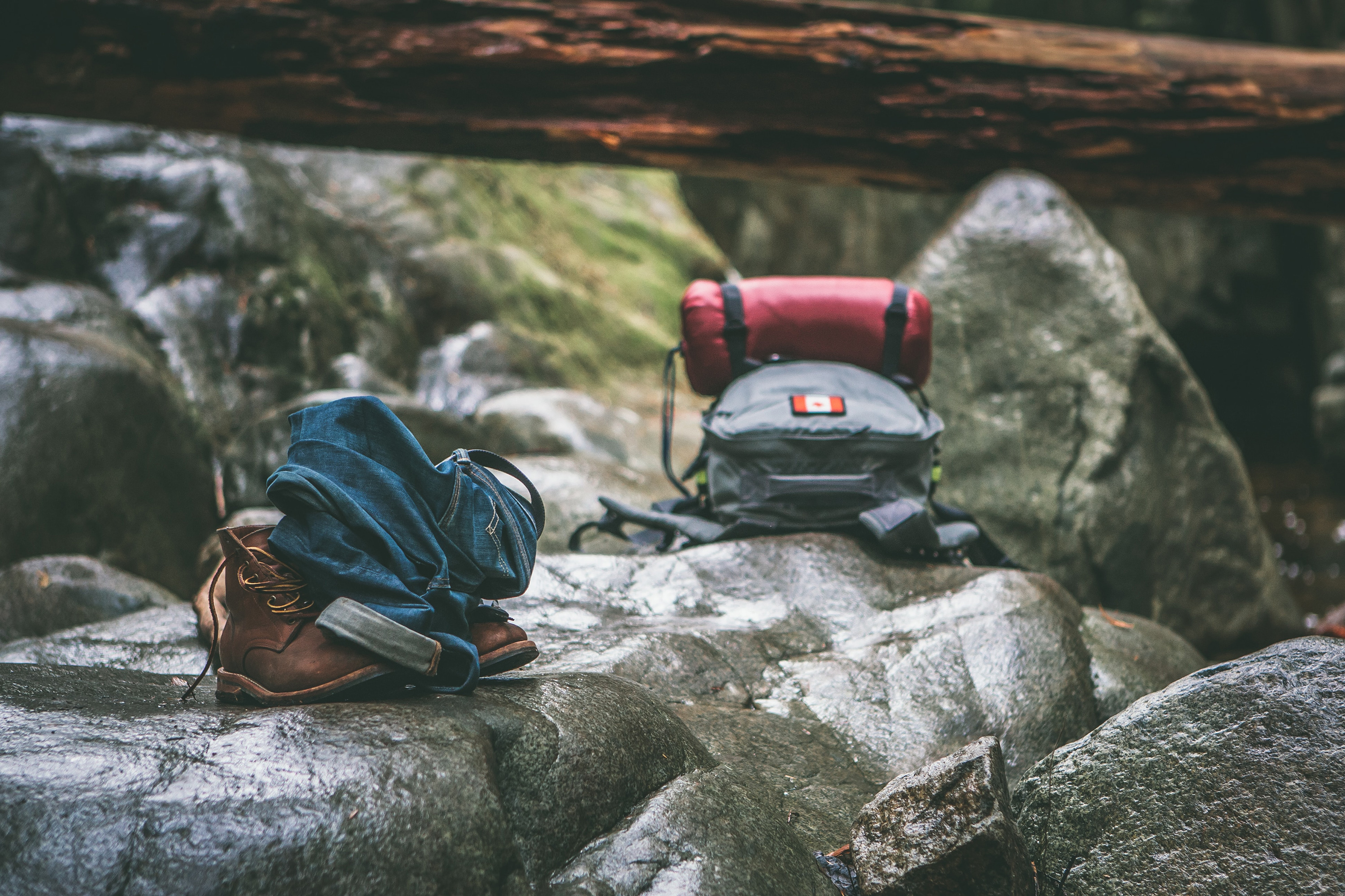 hiking backpacks on rocks