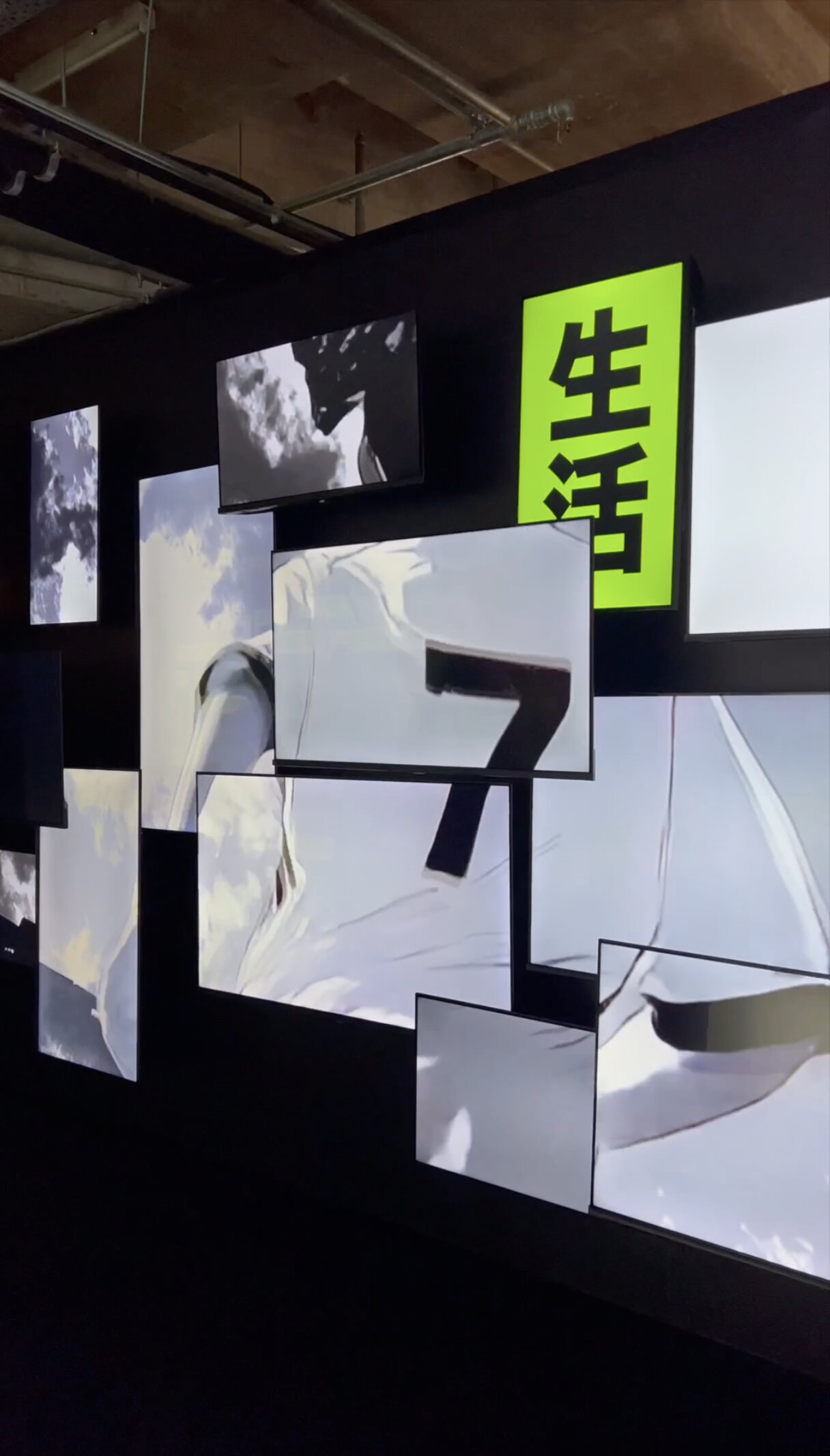 CR7 Life Museum — illuminated lightbox wall forming a giant numeral seven beside the CR7 LIFE panel