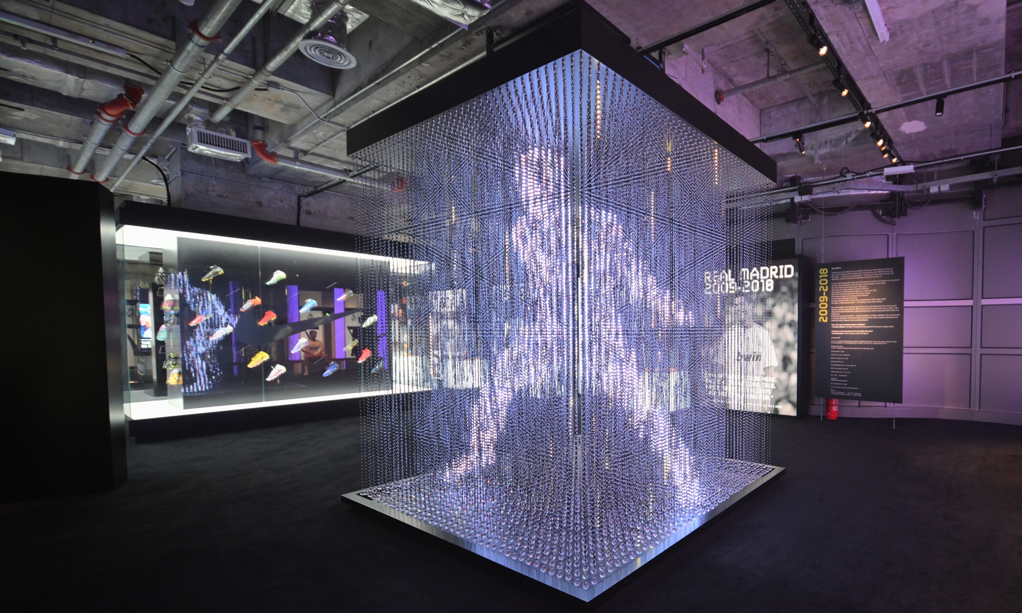 CR7 Life Museum — illuminated crystal sculpture in a darkened gallery room