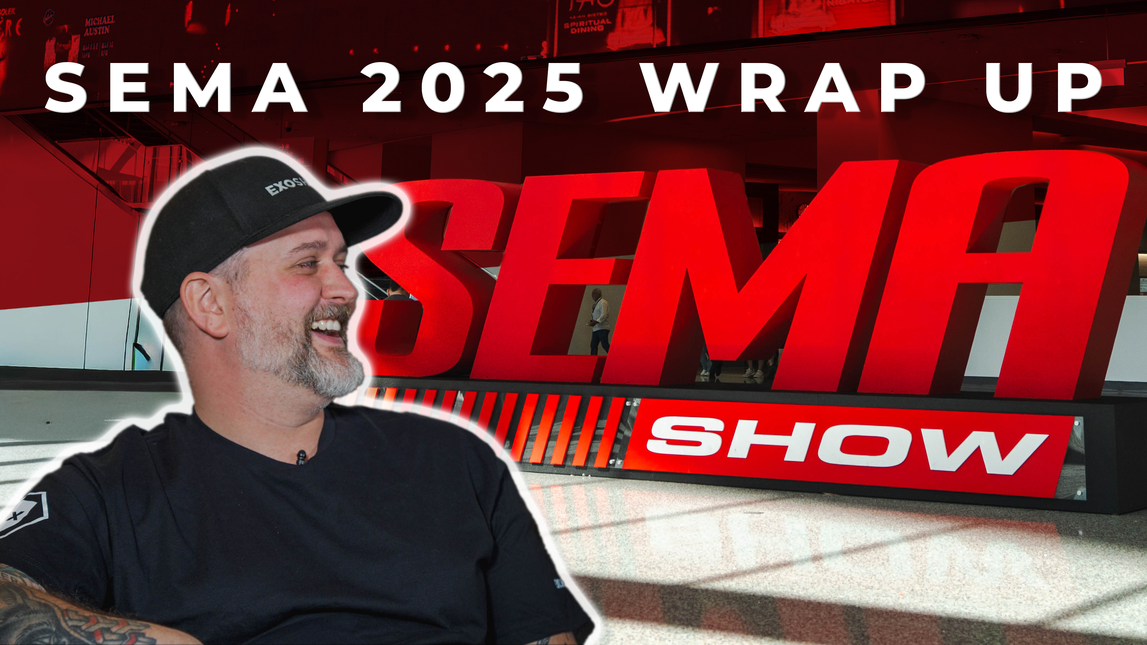 ExoShield Eployee smiling while discussing windshield protection film atSEMA 2025. Background is the SEMA 2025 floor sign with text over top stating "SEMA 2025 WRAP UP"