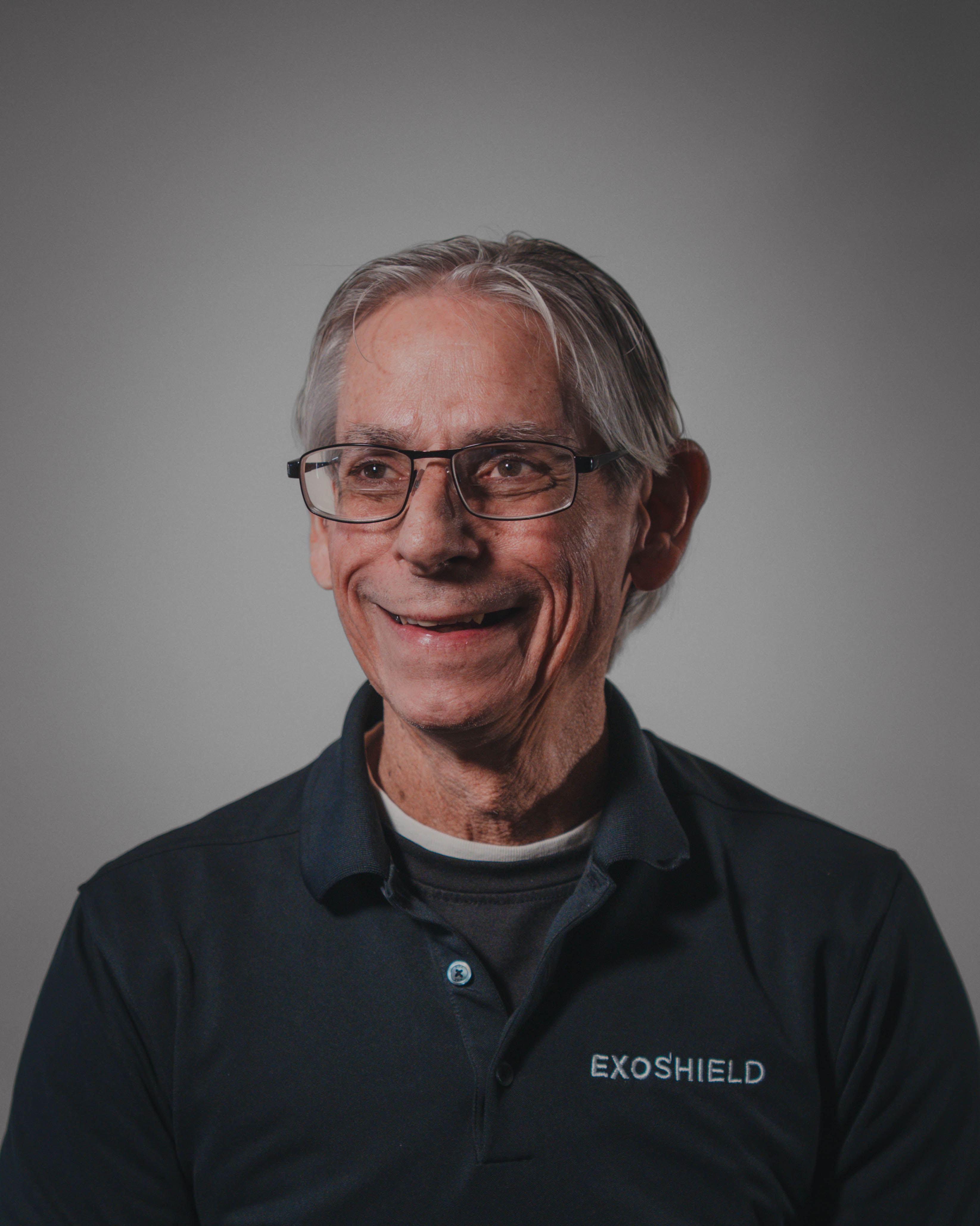 Portrait headshot photo of the West Coast territory sales rep for ExoShield