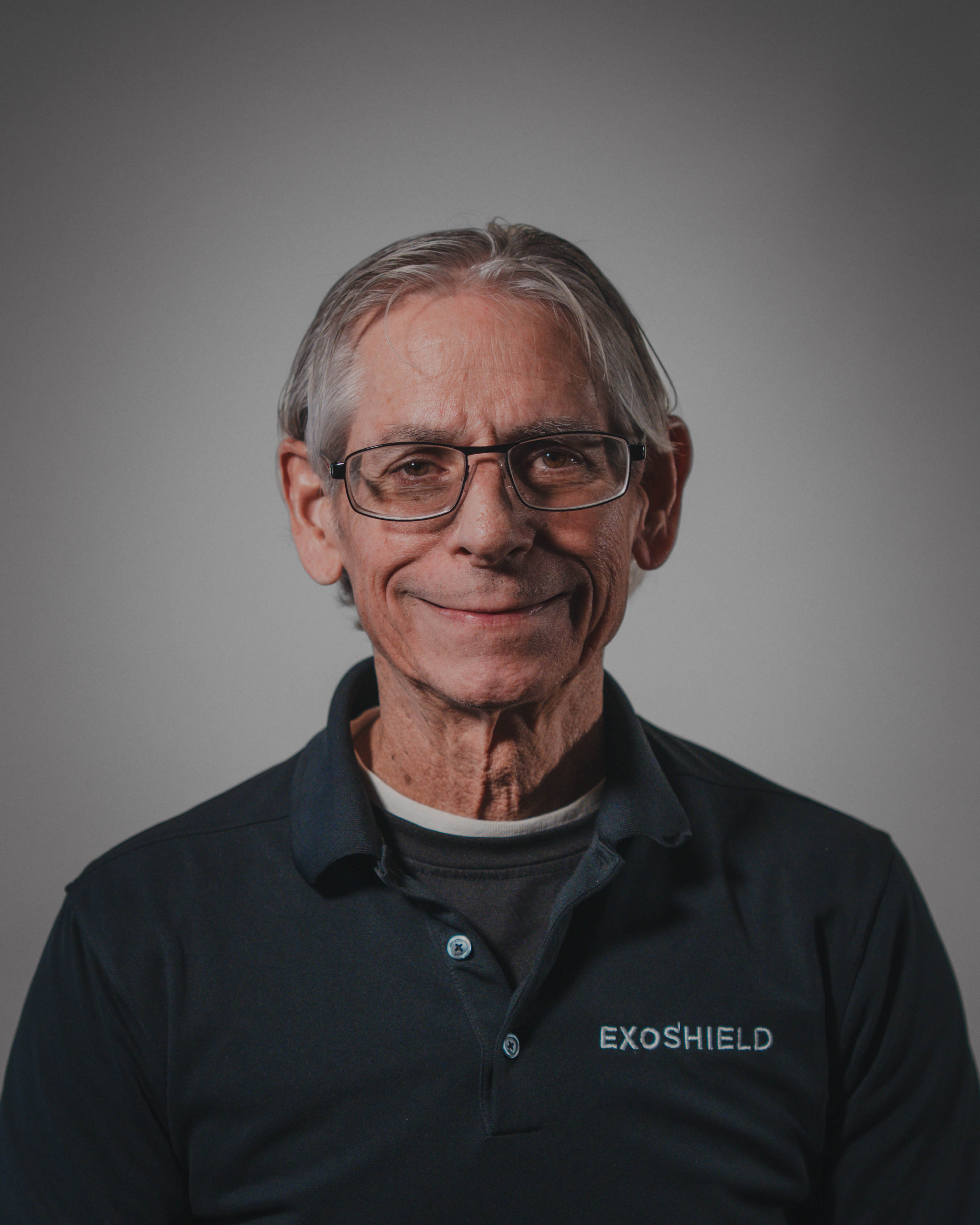Portrait headshot photo of the West Coast territory sales rep for ExoShield