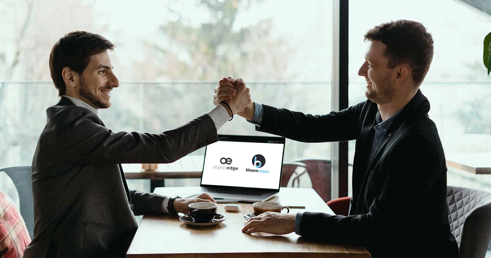 Two business man shaking hands