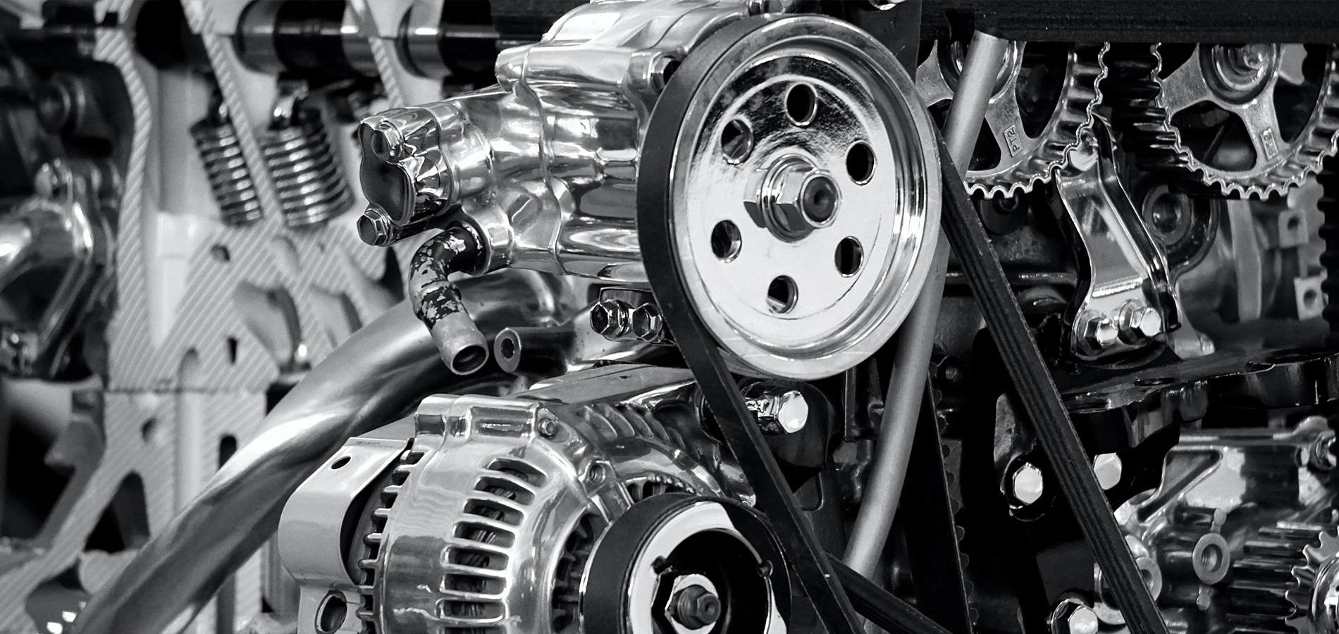 Grayscale photography of a car engine