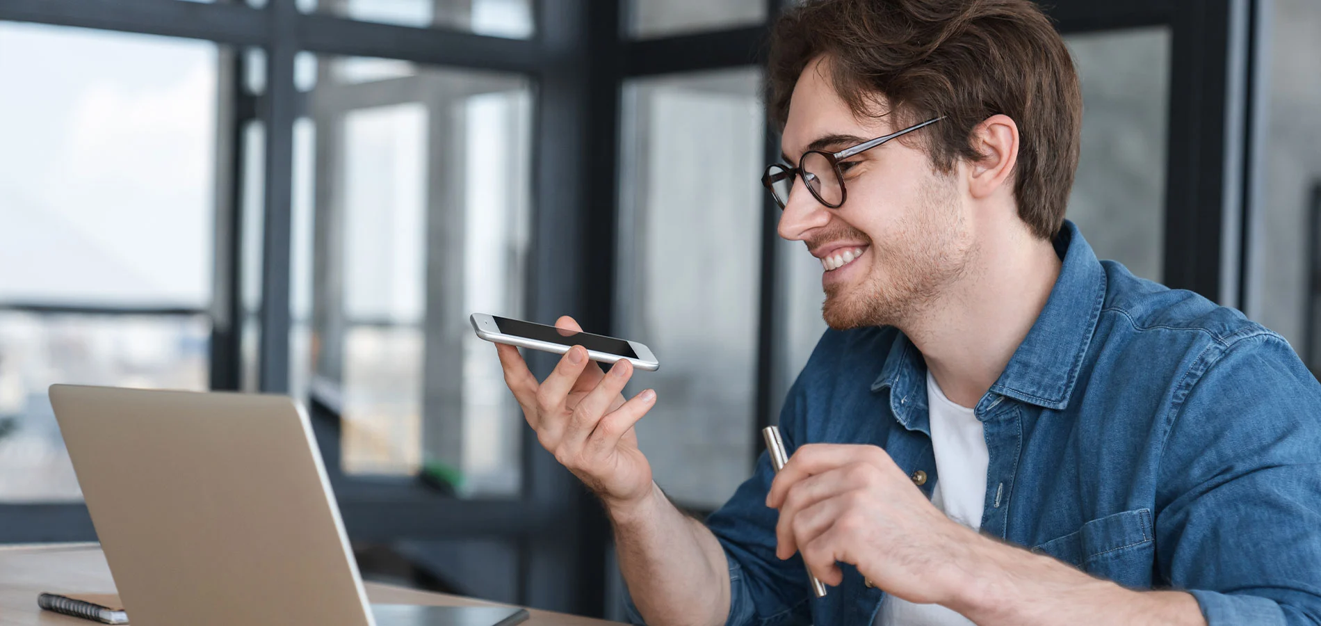 Man recording voice message