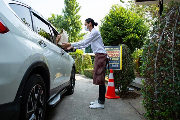 Curbside picks up food beside the road