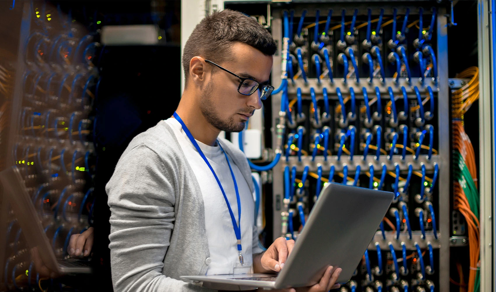 Man managing supercomputer servers
