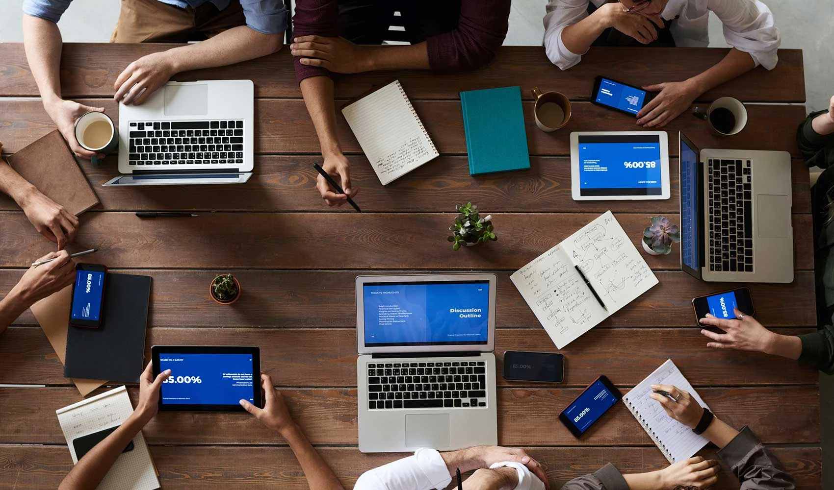 Group of people using their laptop and gadgets