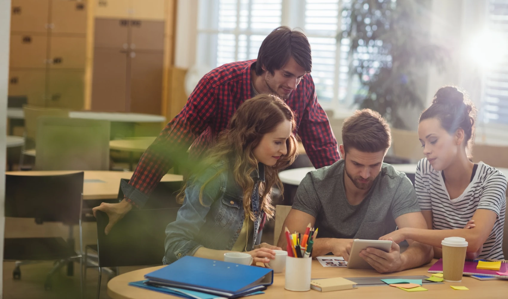 Group of business executives discussing