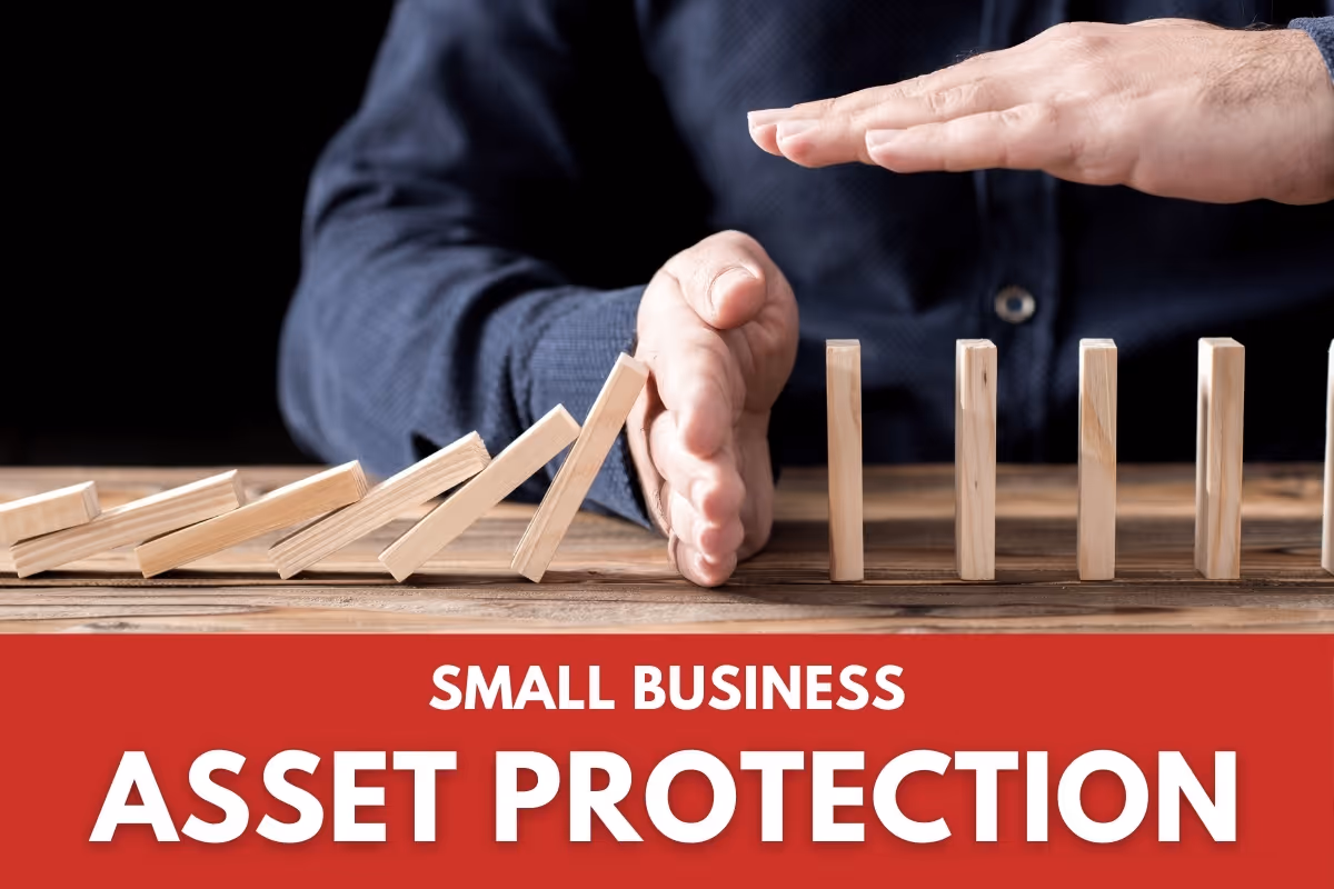Asset Protection - Man protecting some blocks from falling with his hands - Small Business Asset Protection