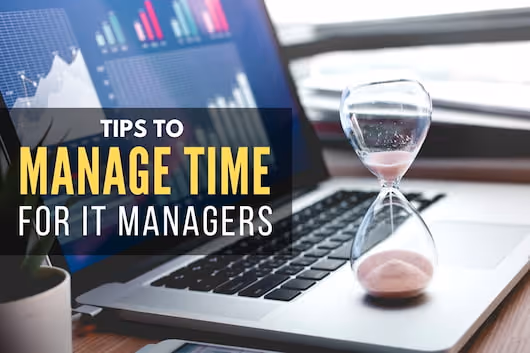 Sand Clock on top of a laptop - How to Manage Time for IT Managers