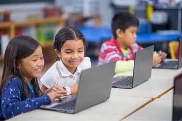 Kids with laptops
