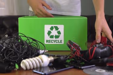Person recycling electronics
