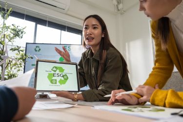 Woman talking about Sustainability to her team