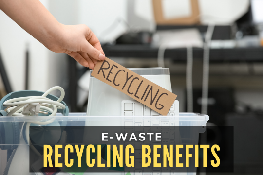 E-Waste Recycling Benefits - Hand holding a sign that says "Recycling"