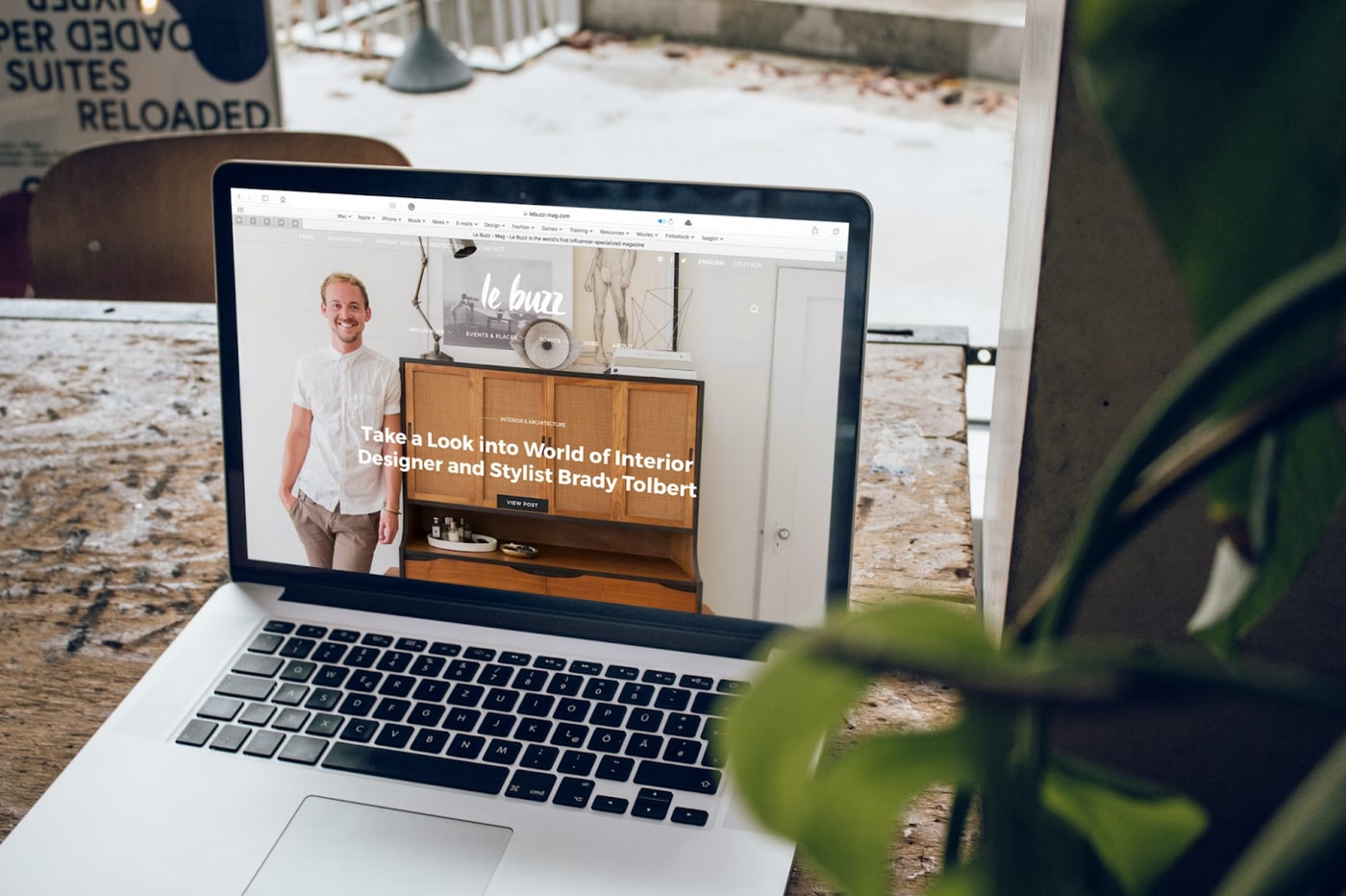 Alt Text: A laptop displays a designer’s website/ portfolio.