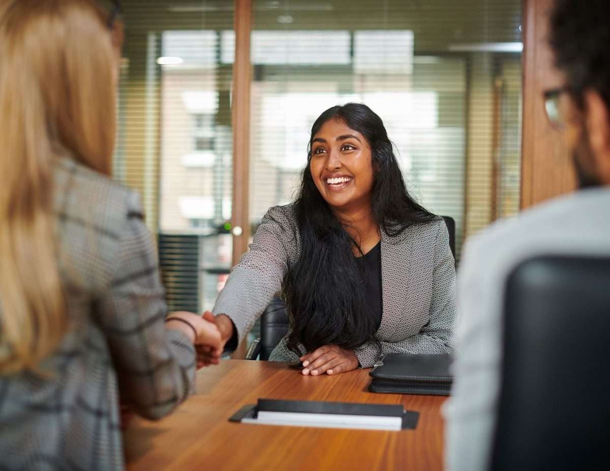 entrepreneur shaking hands with their new AI-business focused PR agents
