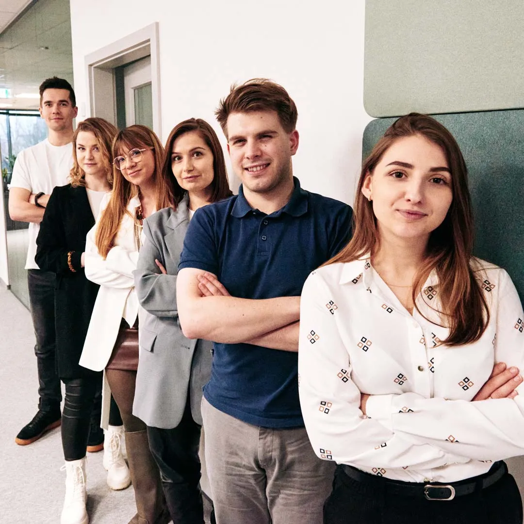 A group of people standing next to each other.