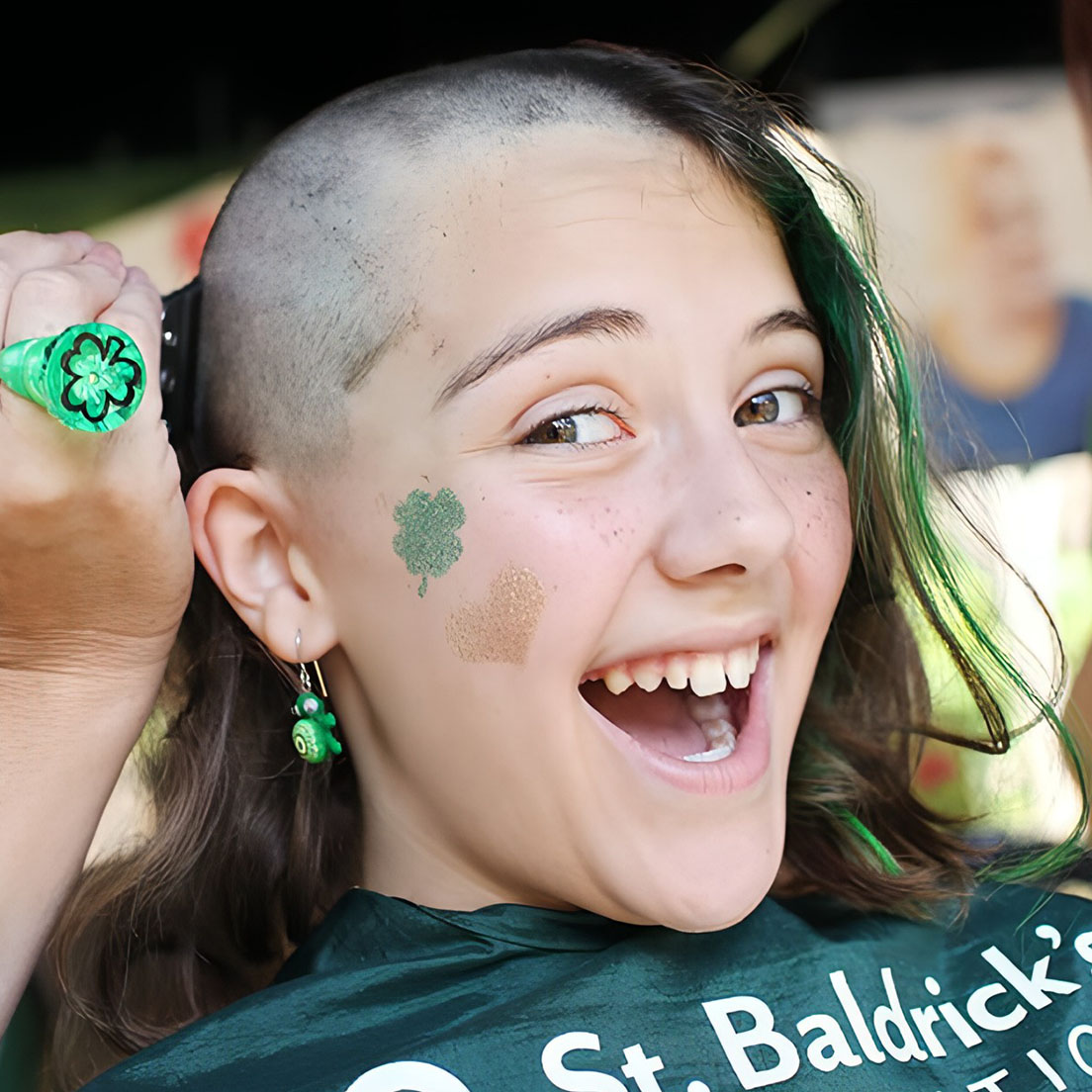A girl is shaving her head for a fundraiser benefiting St. Baldrick’s Foundation.