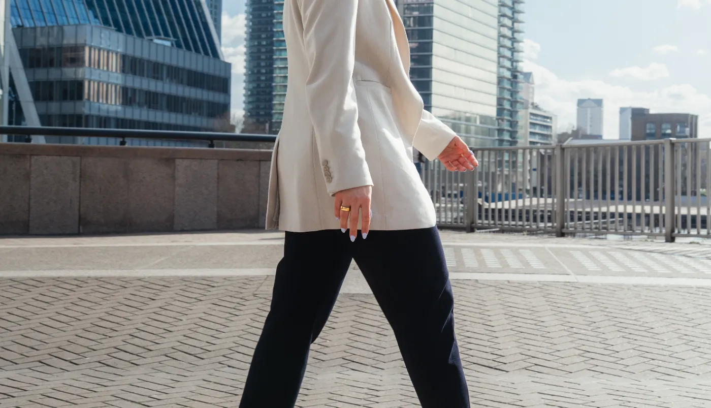 Person walking in the city wearing Circular Ring 2