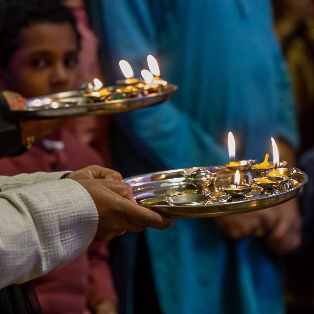 People doing Aarti or Prayers