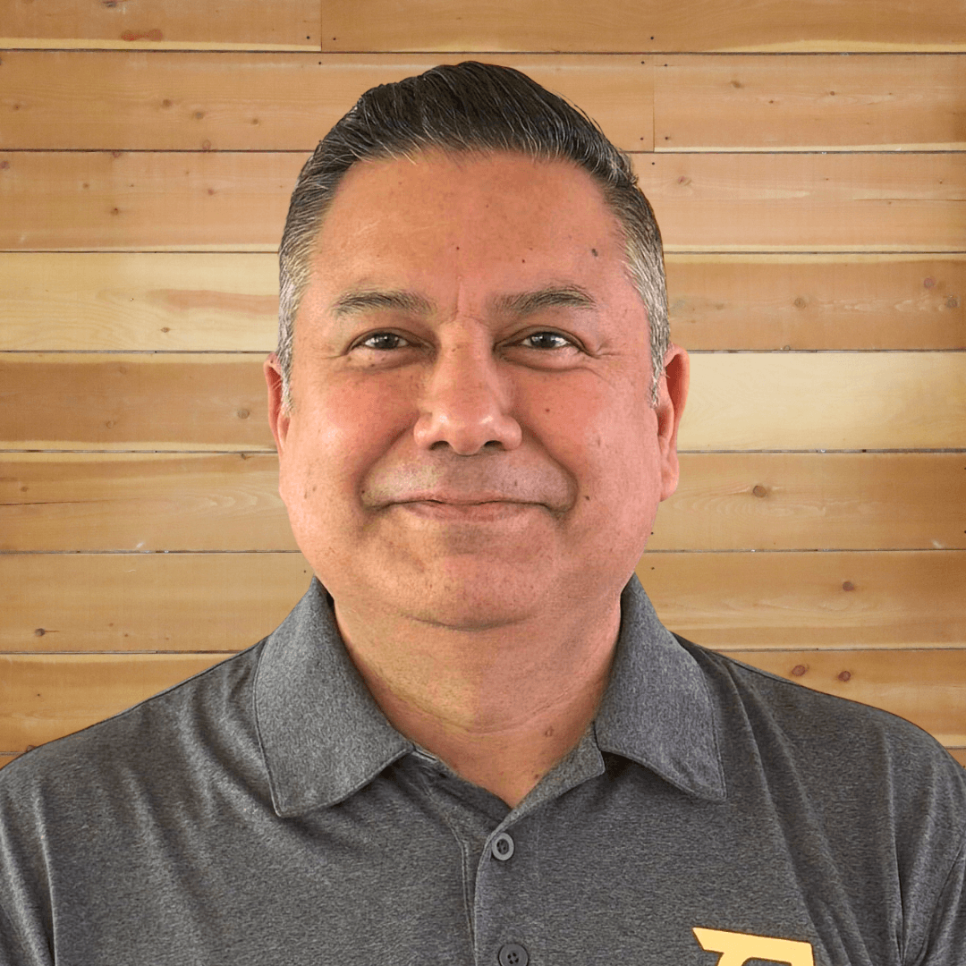 Headshot of Hector Hernandez, Director of Franchise Operations for Starbird Chicken