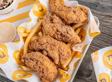 Trays of Starbird Chicken menu offerings