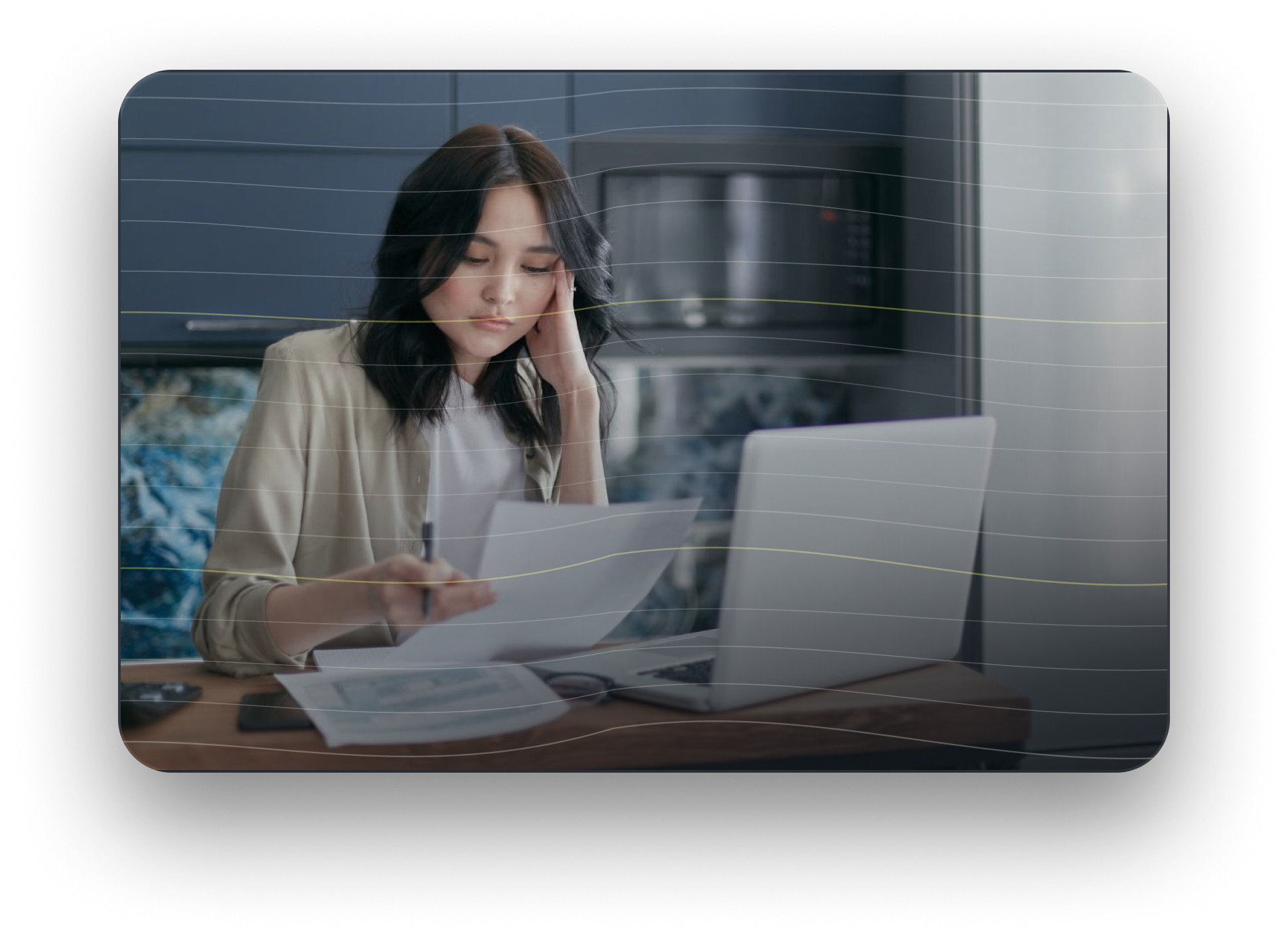 Bank customer managing paperwork during a high-demand period when contact center staff are stretched thin