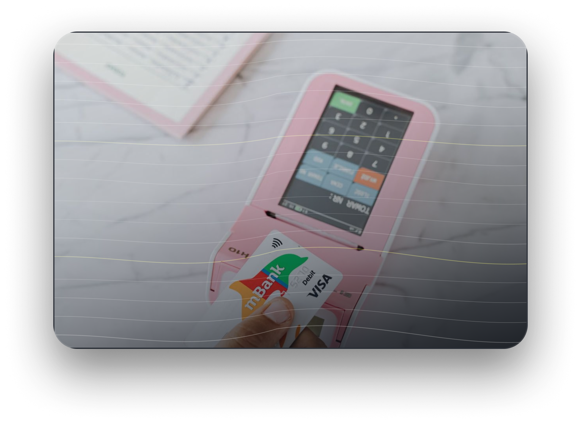 Customer tapping a bank debit card on a payment terminal, one of many channels a bank must connect