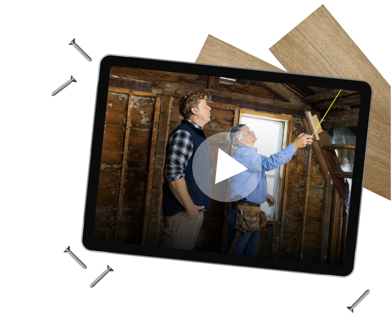 Kevin and Tommy working on a house