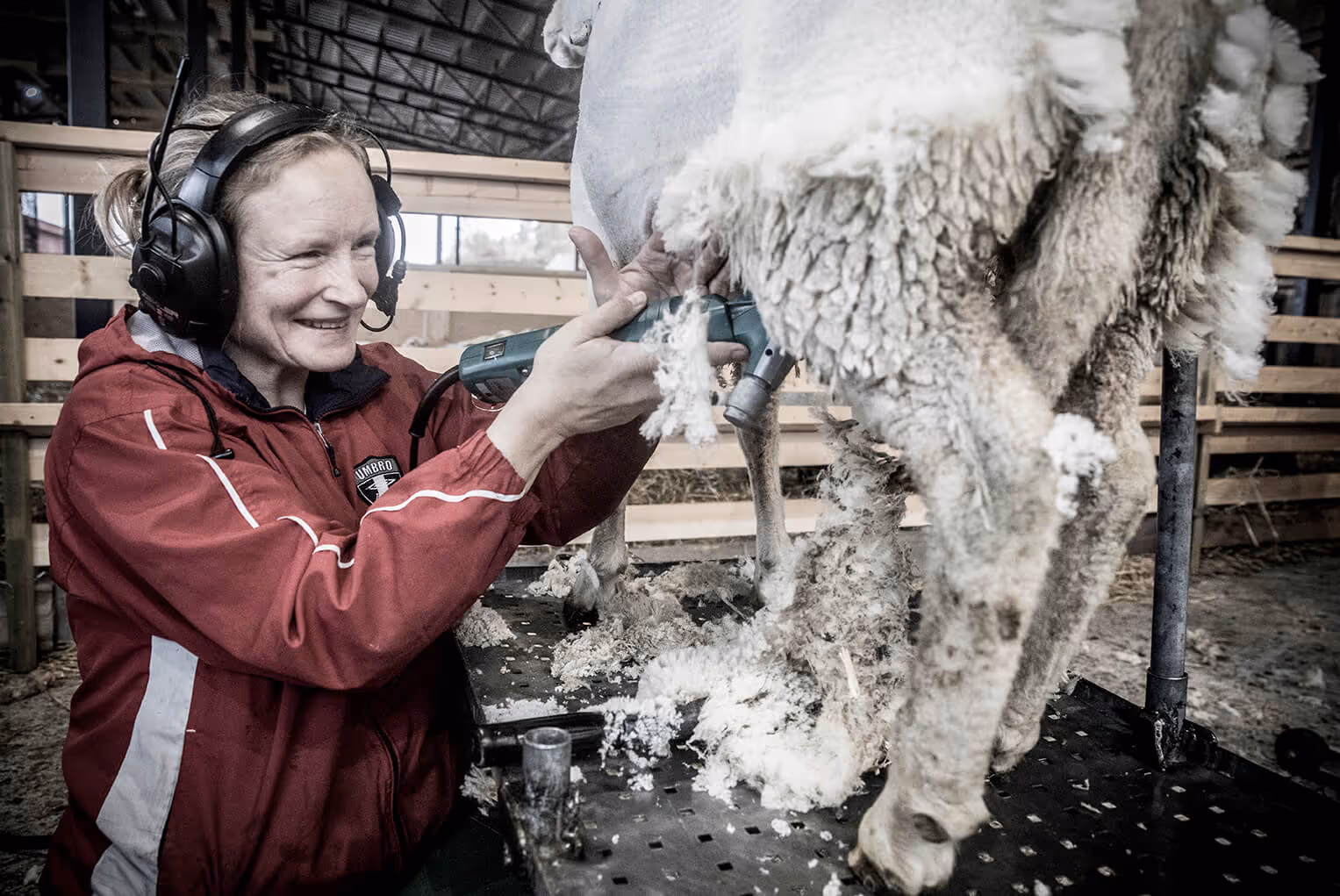 A sustainability consultant inspects a jacket