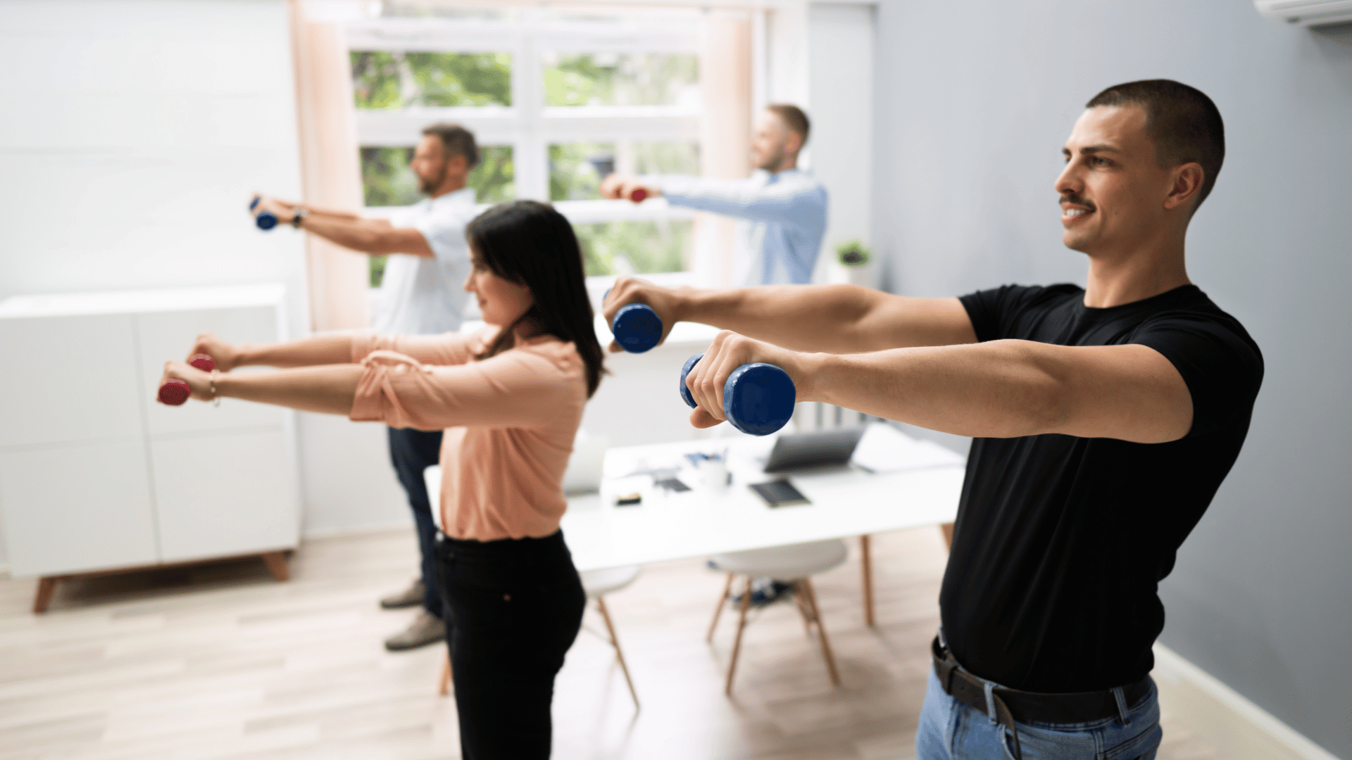 Employees working out in the office
