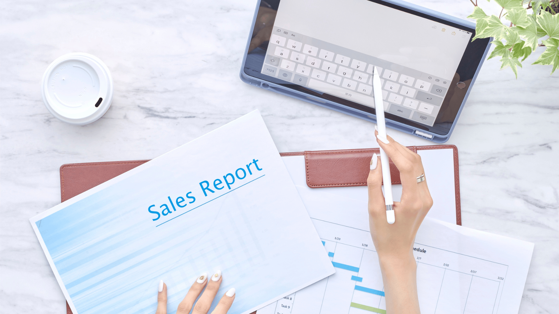 A person looking at a sales report
