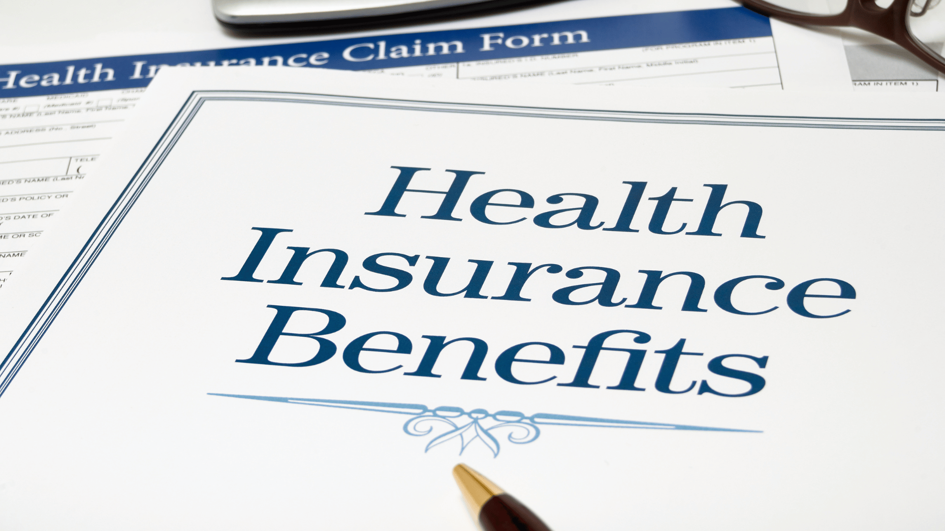 Health insurance benefits information on a desk