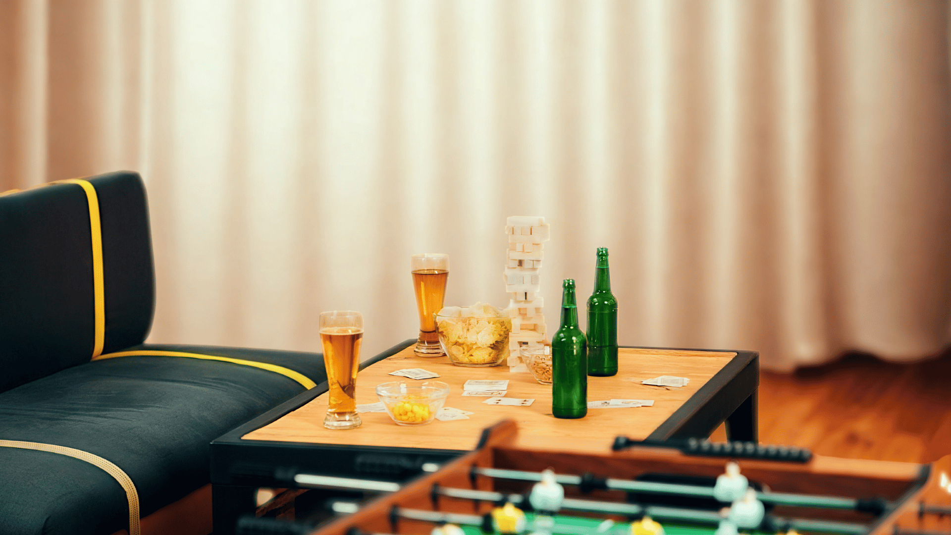 Table with beers and cards on it