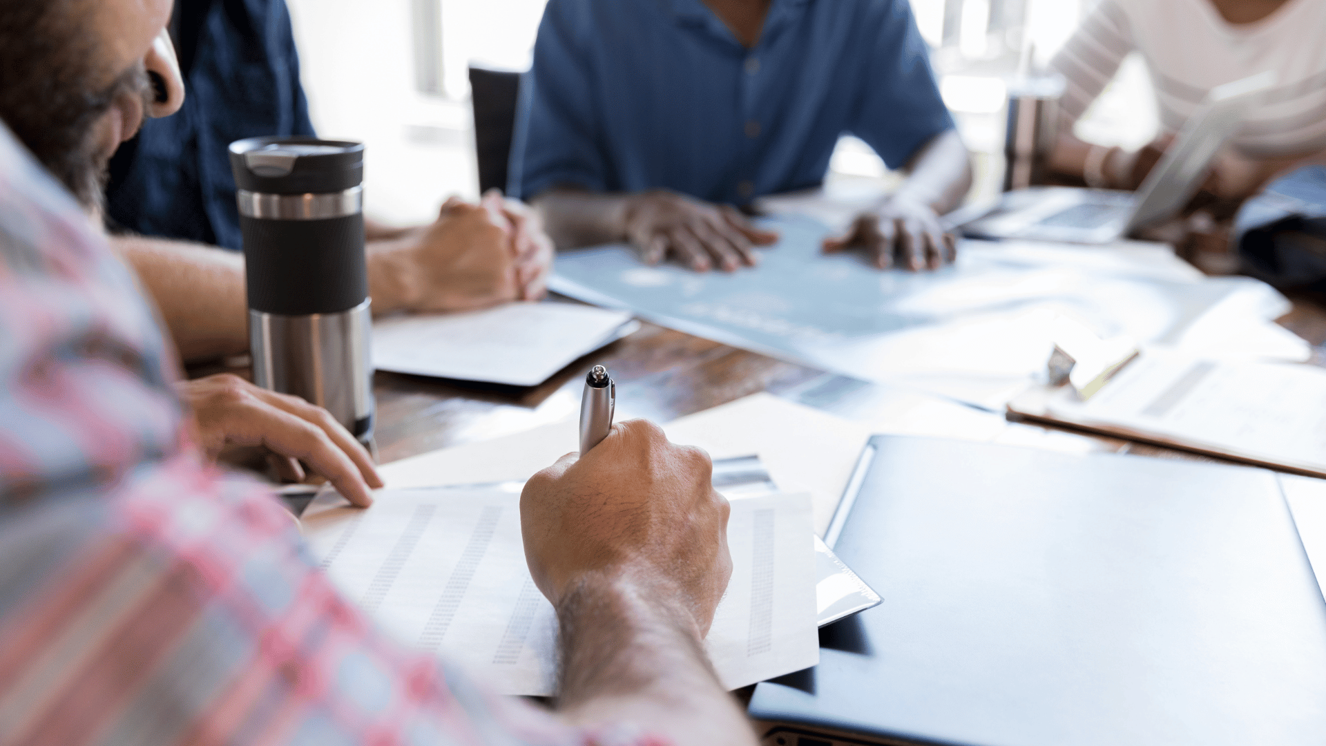A group of people brainstorming at a table