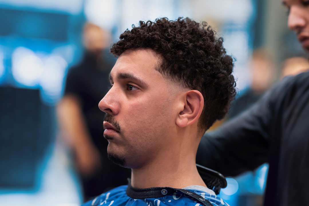 Men's Low Taper Fade With Blowout Hairstyle