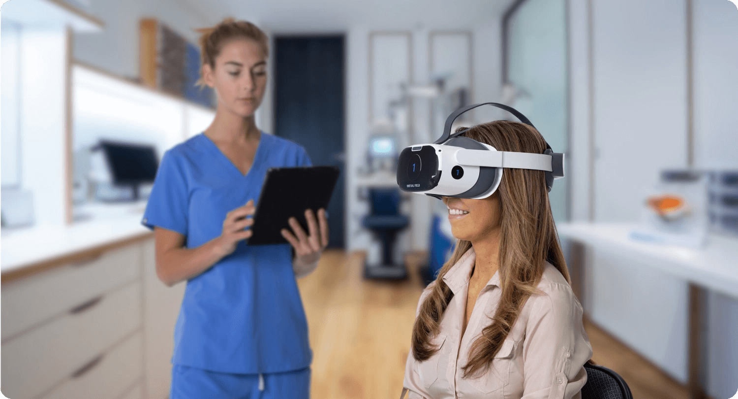 A technician in blue scrubs conducts a Virtual Field test on a female patient in a pink shirt