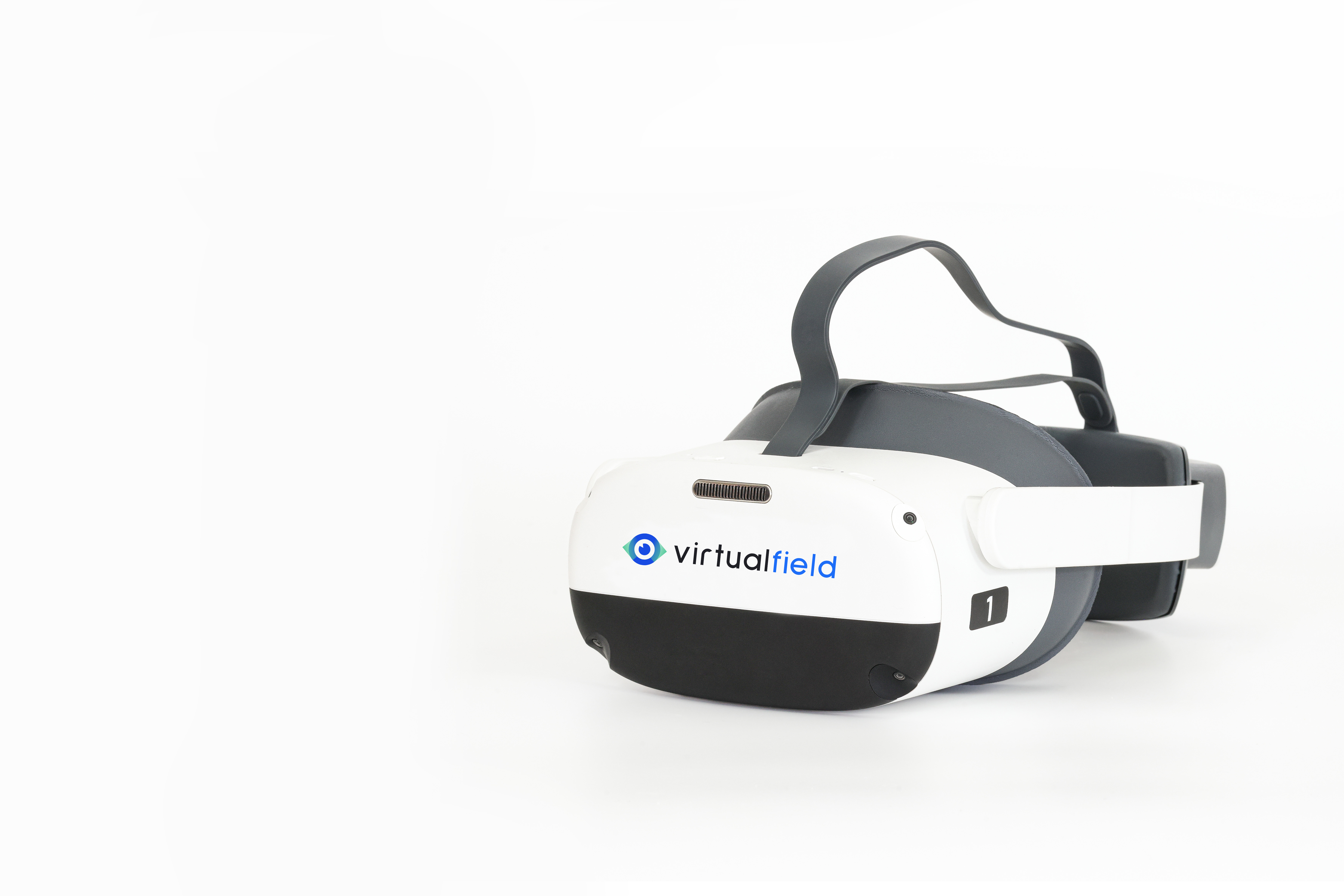 A Virtual Field headset sits against a white background