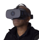A a man wearing a Virtual Field headset