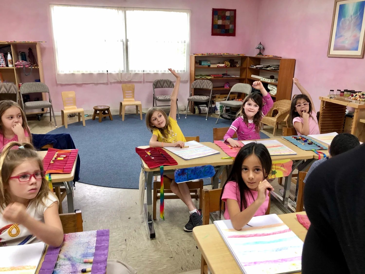 Students working at their desks in a Waldorf School of Palm Beach classroom