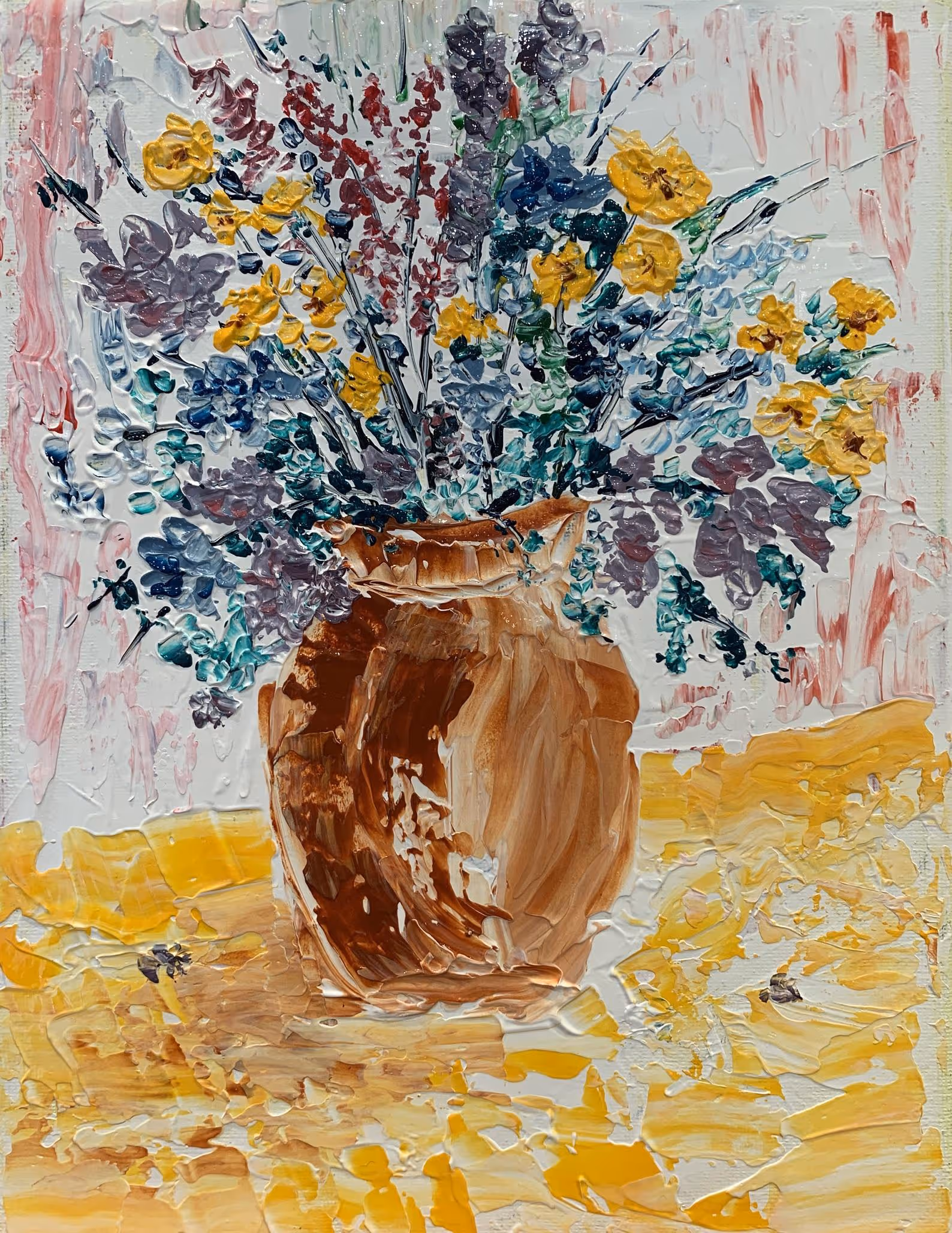 Wildflowers spilling out of their terracotta vase on a sunlit table. The scent of the gentle petals fills the room.