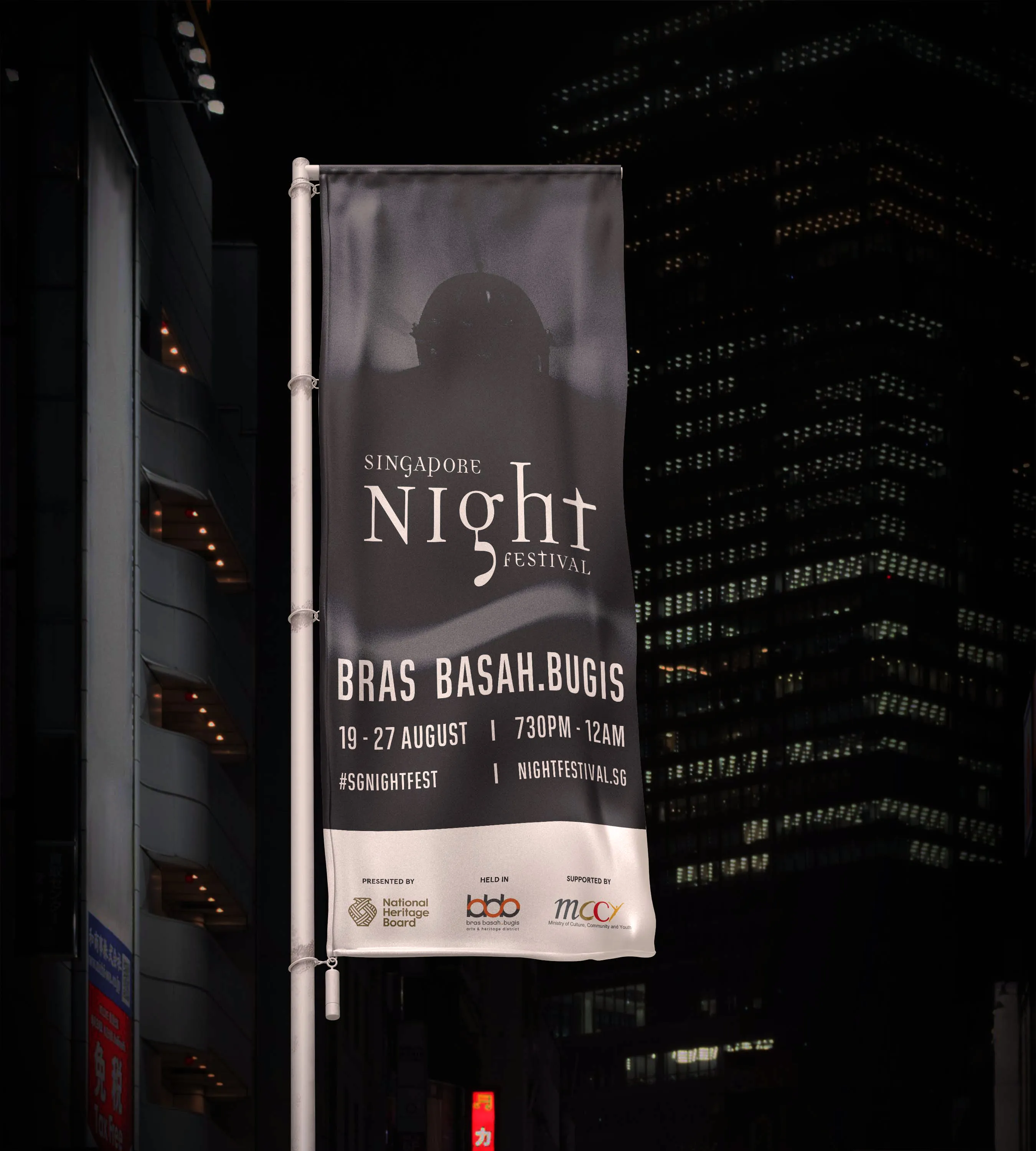 a sign on a pole in front of a building